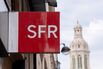 A sign outside an SFR phone store, a unit of Altice France, in Paris. 