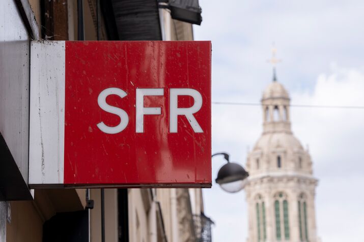 A sign outside an SFR phone store, a unit of Altice France, in Paris. 