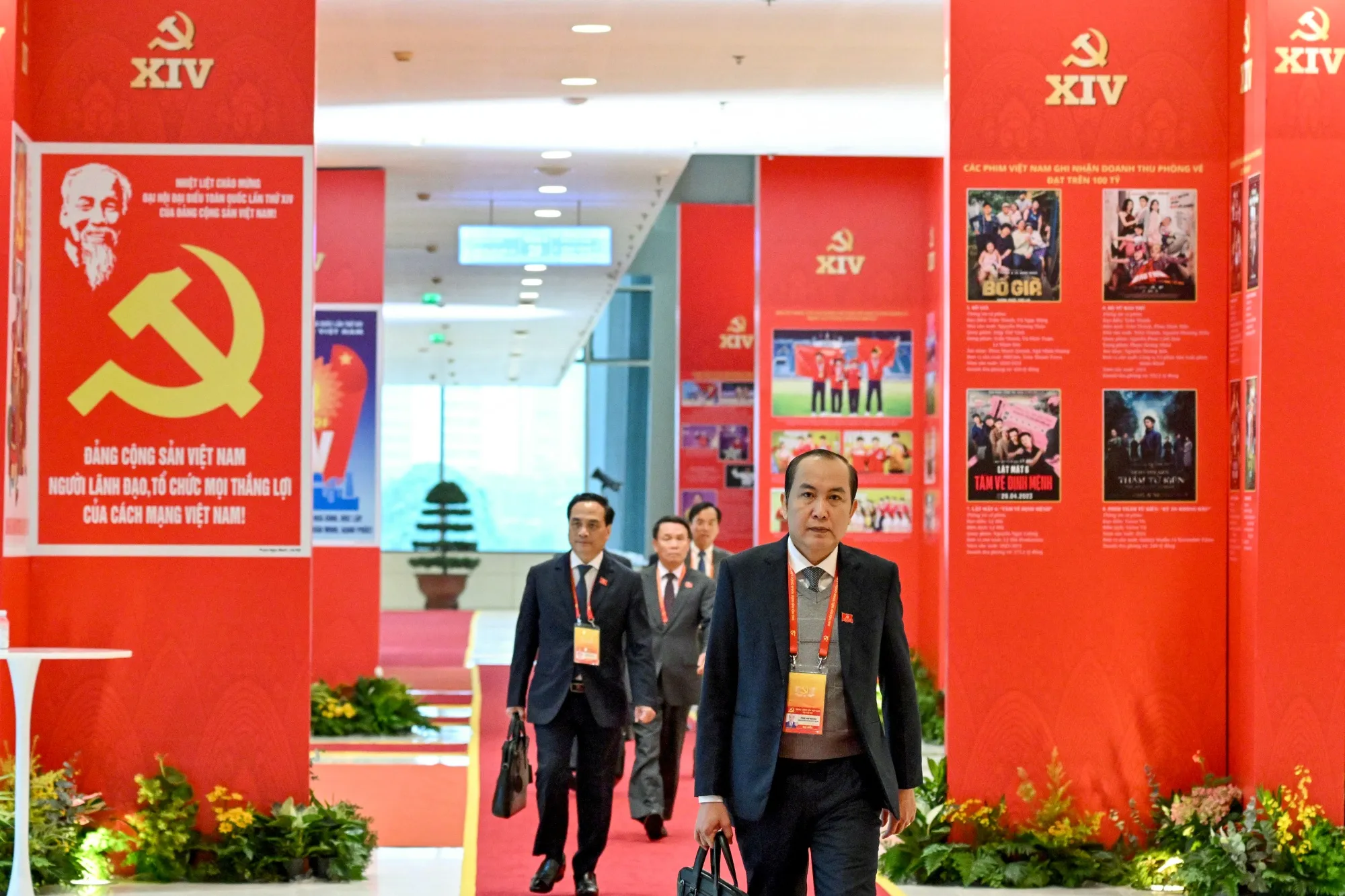 Delegates arrive to attend the meeting of the 14th National Congress of the Communist Party of Vietnam in Hanoi, on Jan. 21.