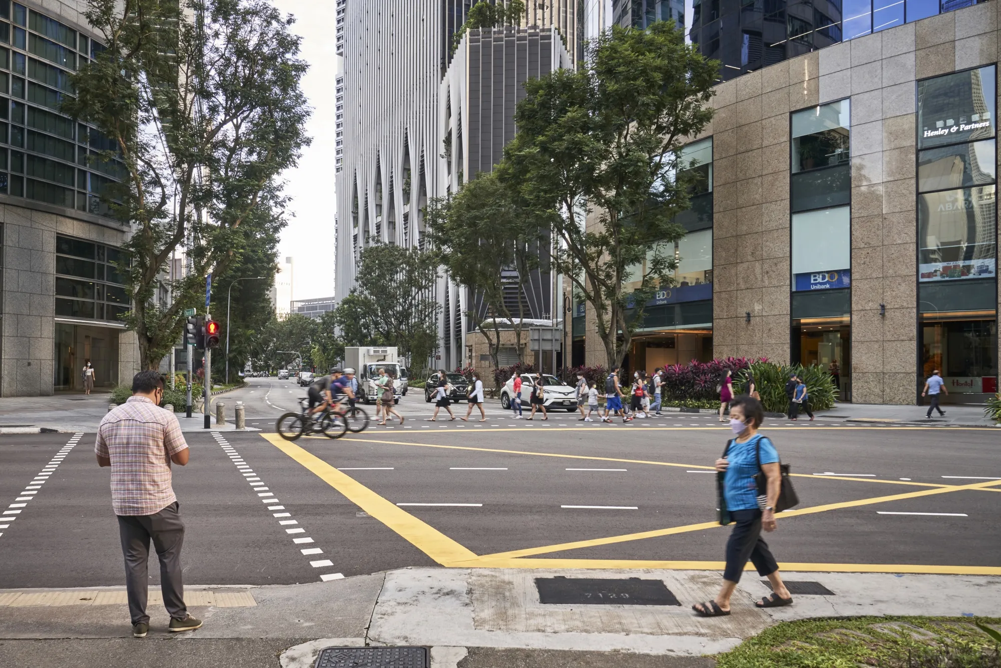 Pedestrians in the central business district in Singapore, on Sept. 6.