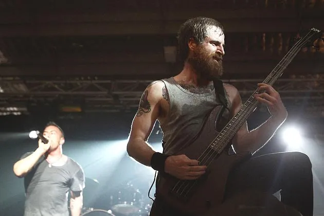 Greg Puciato and Liam Wilson of Dillinger Escape Plan perform on stage during Soundwave 2012 in Sydney