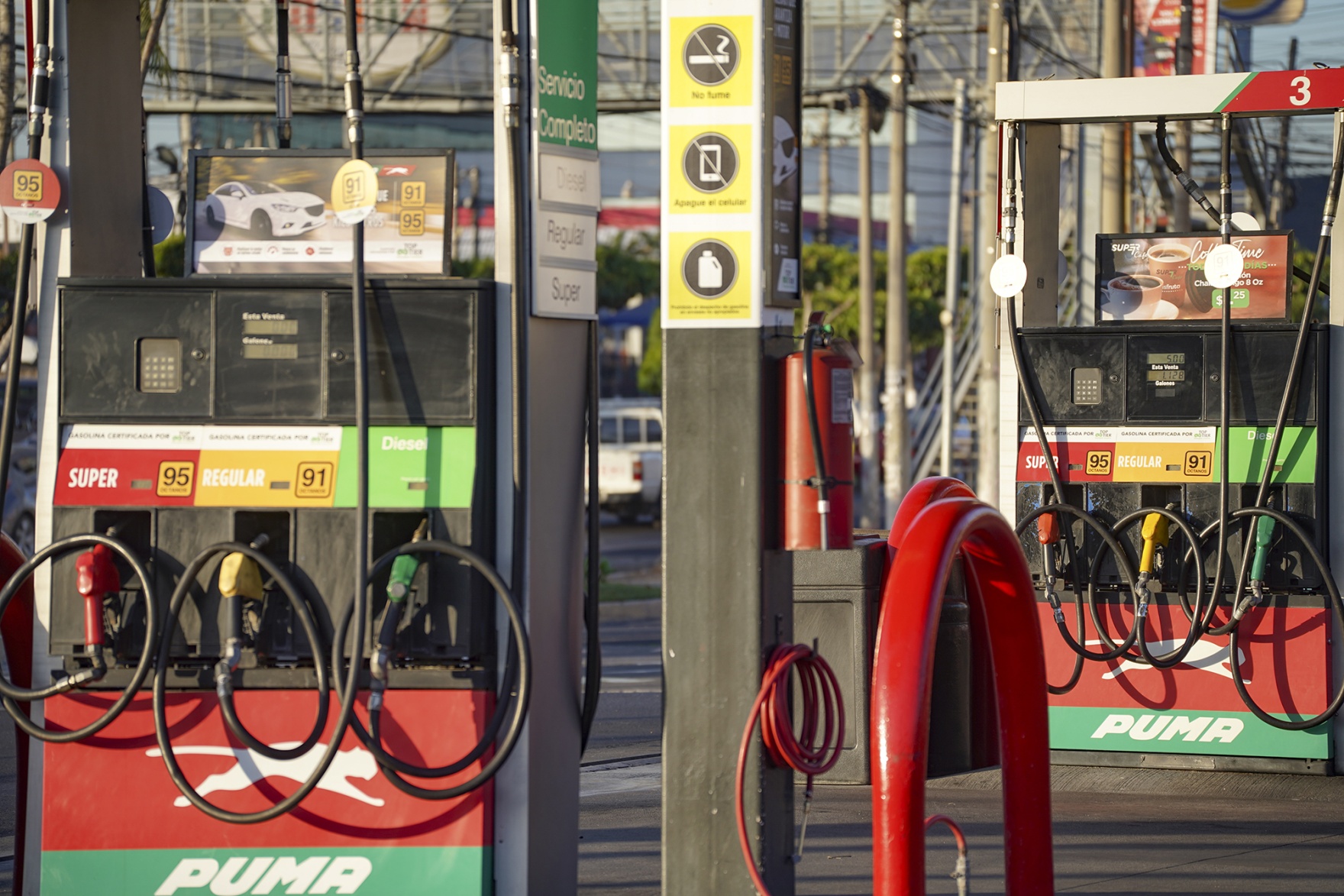 Gas pumps at a gas station in San Salvador, El Salvador.