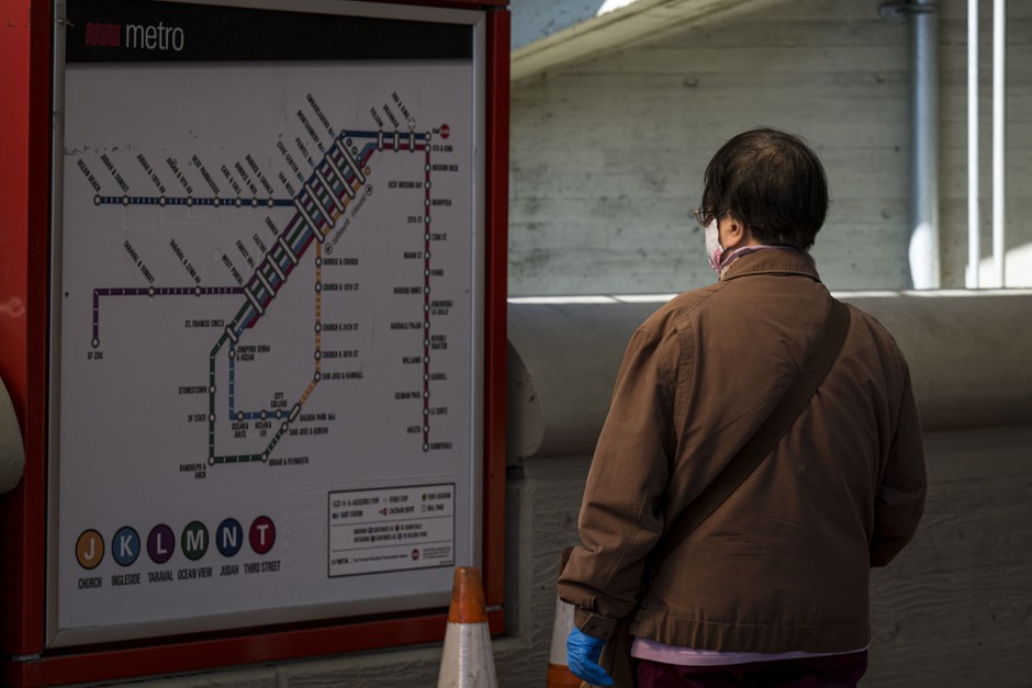 A San Francisco Muni rider considers the available transit options.