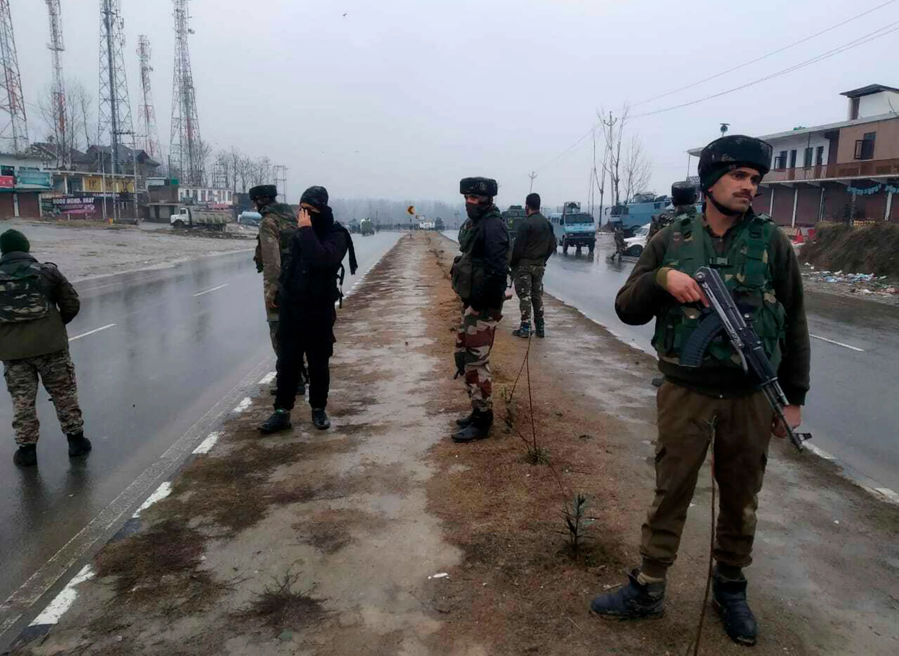 Indian&nbsp;soldiers patrol near the site of an explosion in Pampore, Kashmir, on Feb. 14.