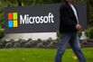 A pedestrian walks by at the Microsoft campus in Redmond, Washington.