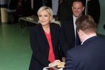 HENIN-BEAUMONT, FRANCE - MAY 07:  French far-right presidential candidate Marine Le Pen casts her ballot as she votes for the 2nd round in a polling station on May 7, 2017 in Henin-Beaumont, France.  Liberal candidate Emmanuel Macron is facing far-right candidate Marine Le Pen in an election that has sewn sharp divisions in France.  (Photo by Sylvain Lefevre/Getty Images)