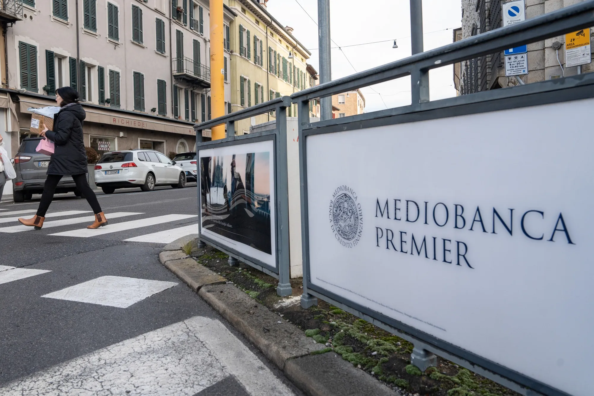 An advertising billboard for Mediobanca bank in Milan.