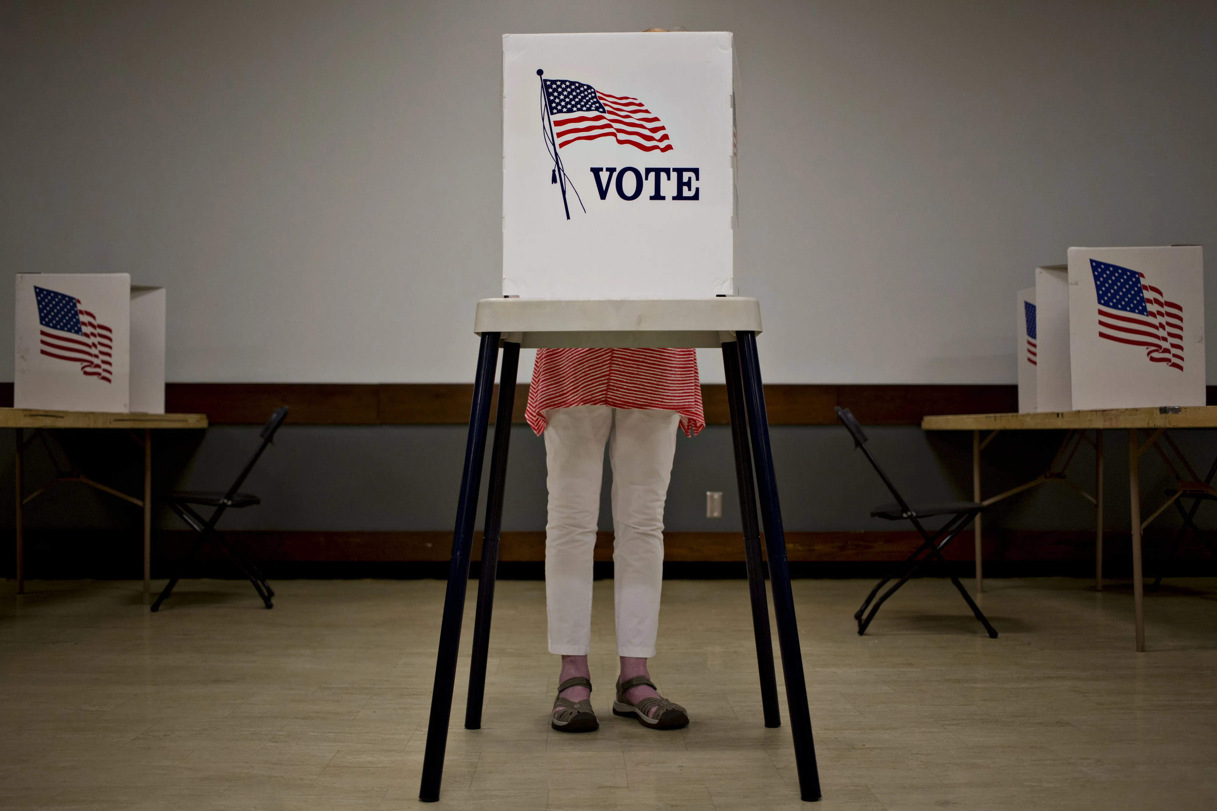 A voter fills out a ballot at a polling location in Cedar Rapids, Iowa.