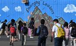 Students walk to their classrooms at a public middle school in Los Angeles.