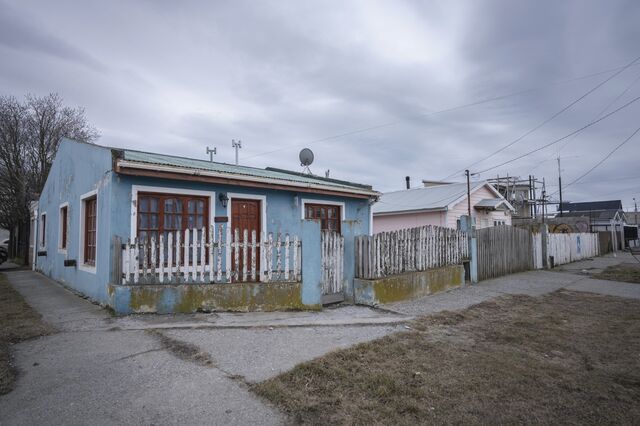 Modest single-story homes cluster around sprawling electronics and textiles factories in Rio Grande.