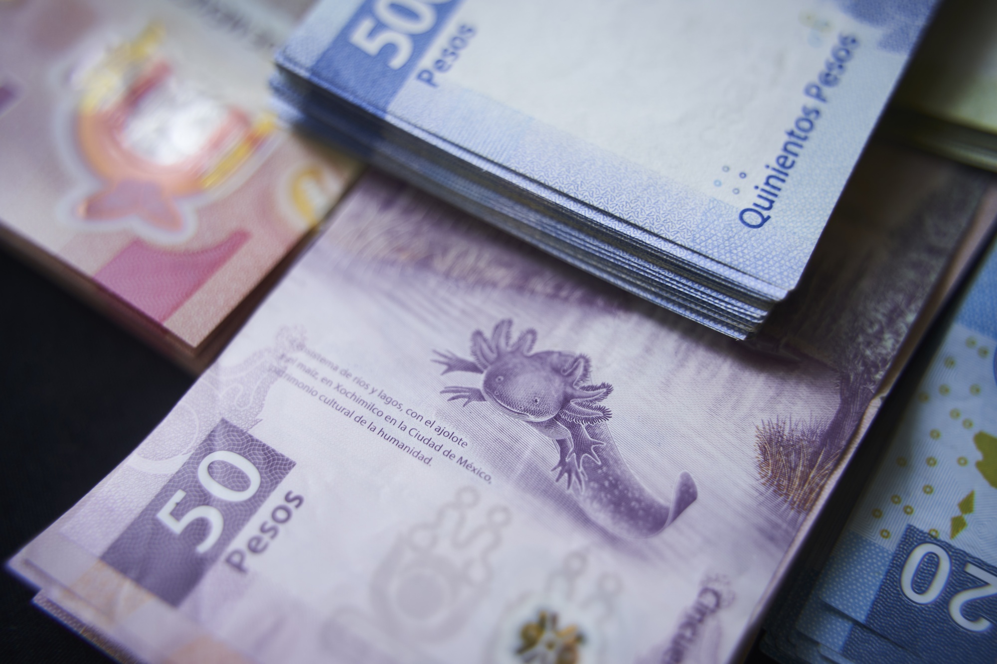 Breaking 50 leads to stronger peso