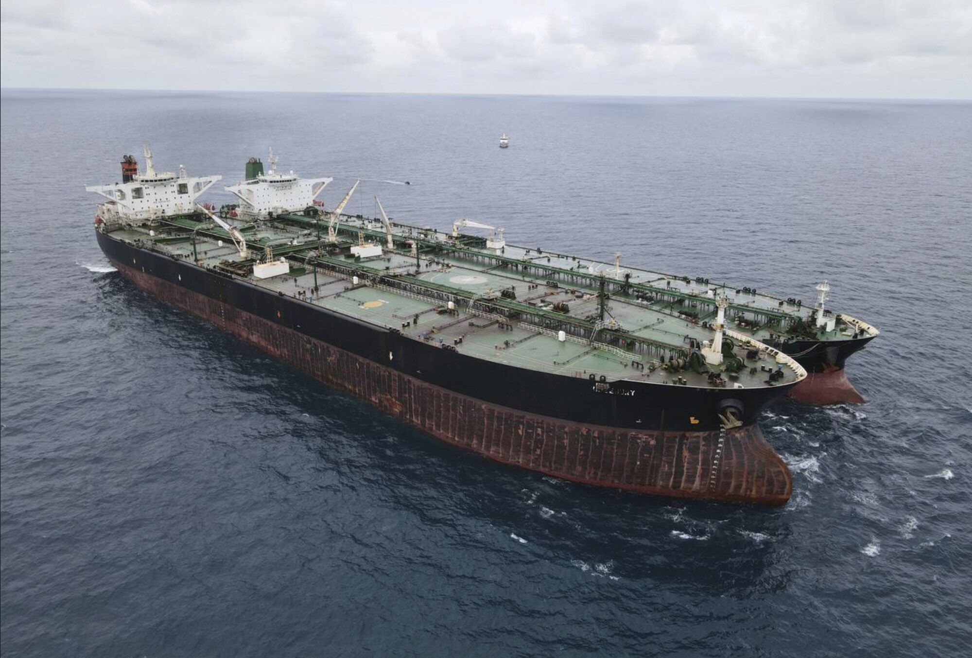 MT Frea, left, and Iranian-flagged MT Horse tankers anchored in Pontianak waters off Borneo island, Indonesia, Jan. 24.  