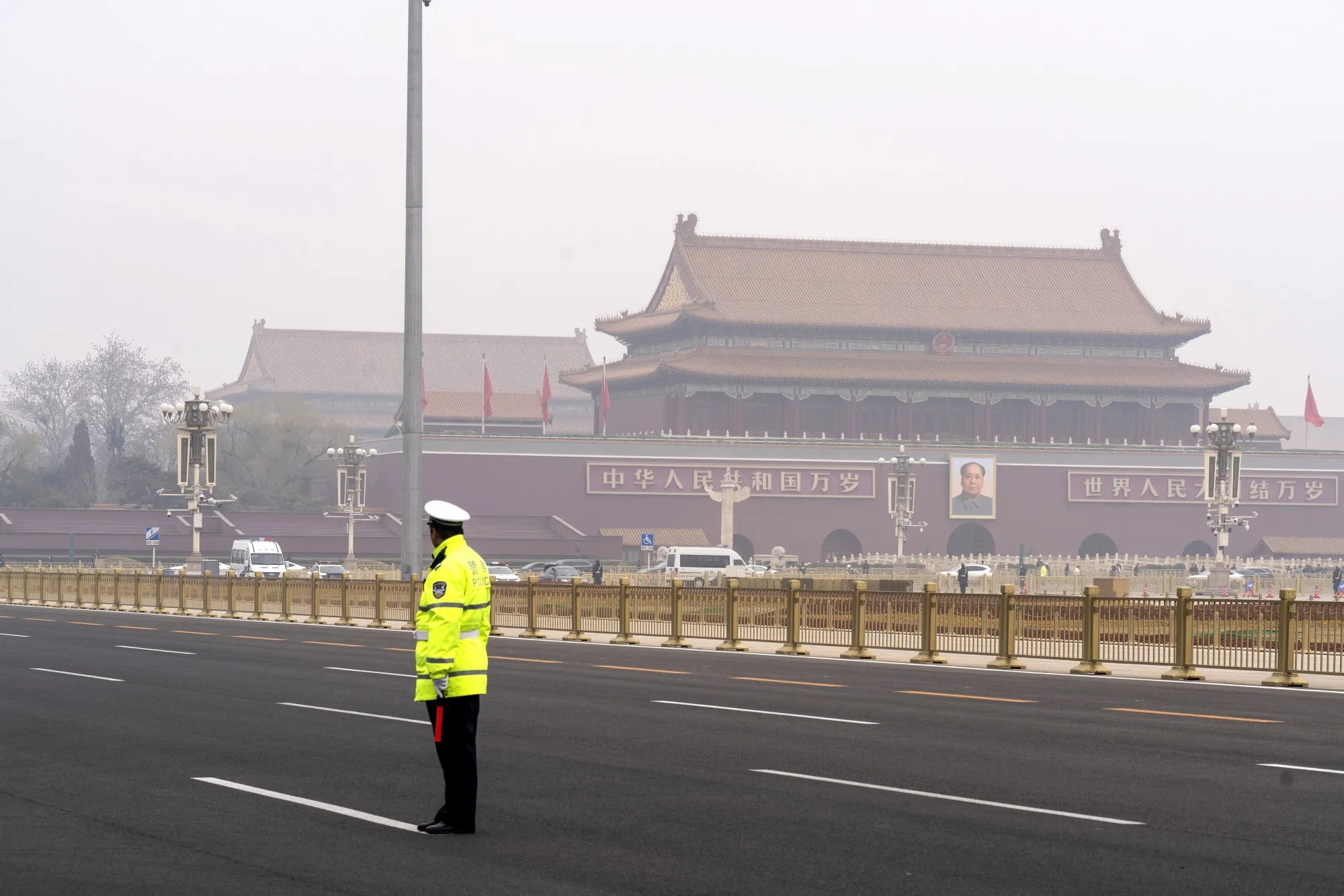 A police officer stands guard at Tiananmen Square.&nbsp;