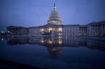 The U.S. Capitol is reflected in a Capitol Visitor Center fountain in Washington, D.C., U.S.