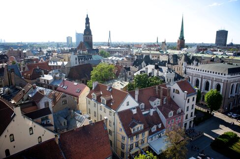 Cameron Rouses Latvia Euro Foes Ignored in Currency Push