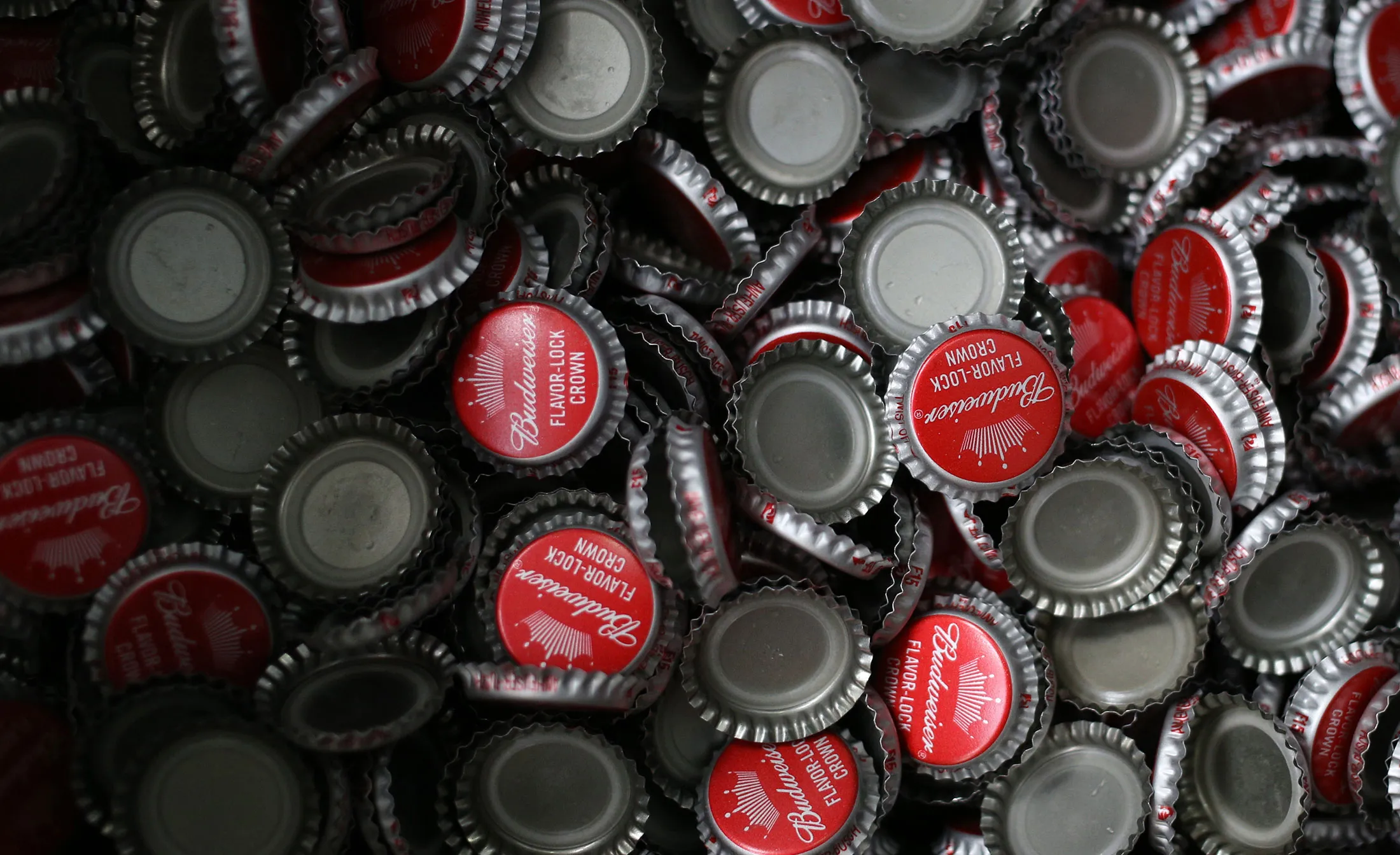 Faced with declining popularity of its flagship Bud and Bud Light brands, AB InBev is looking elsewhere for growth with different beer styles, new packaging like recloseable aluminum bottles and acquisitions of fast-growing American craft brews such as Elysian and 10 Barrel.
