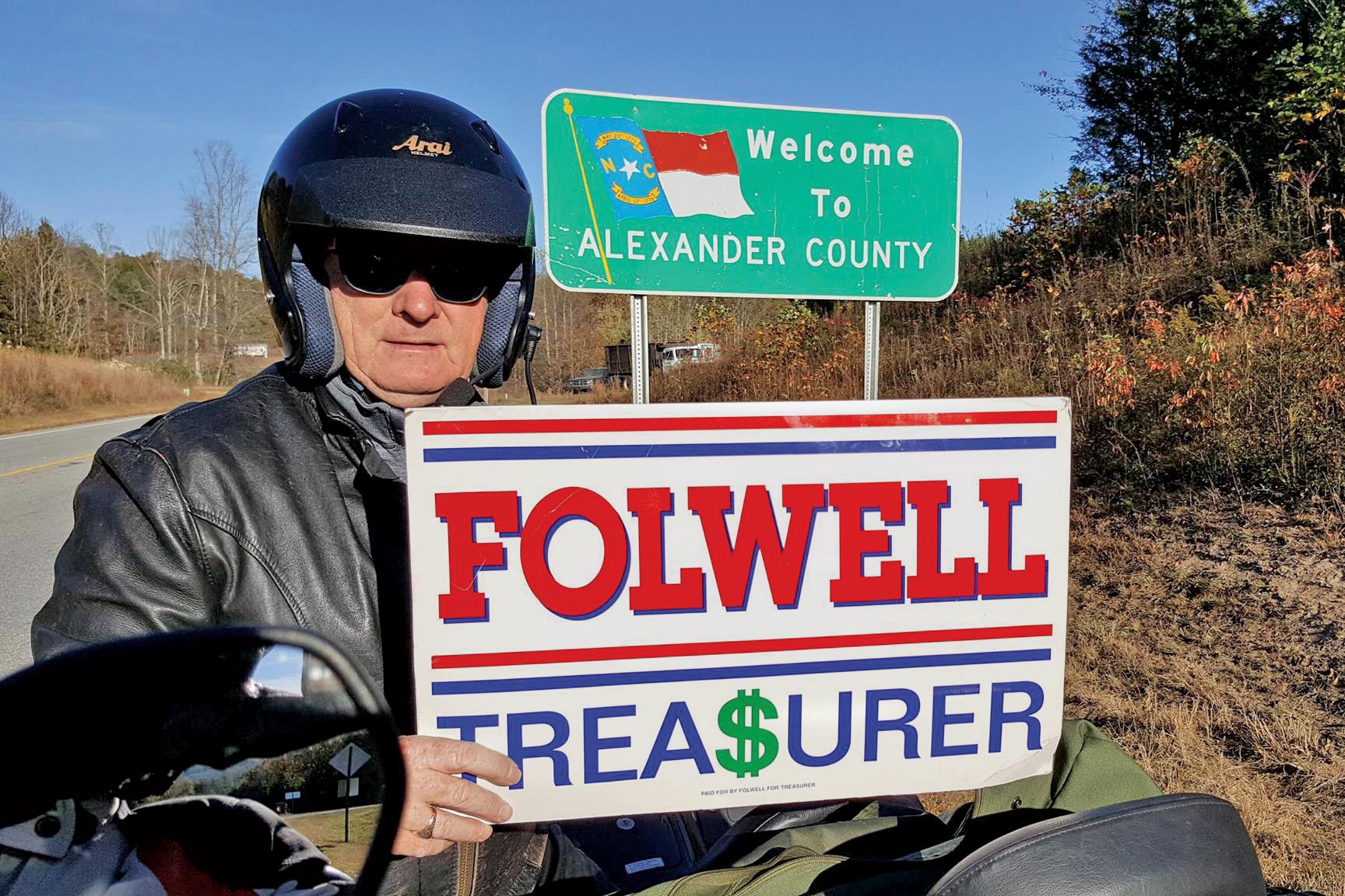 Folwell campaigning on his motorcycle.
