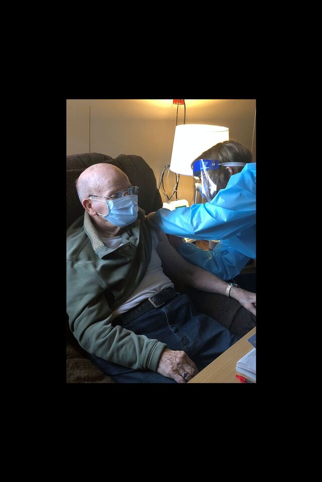 Pictured: A St. Paul Elder Services nursing home resident receives the Covid-19 vaccine. Courtesy of St. Paul Elder Services