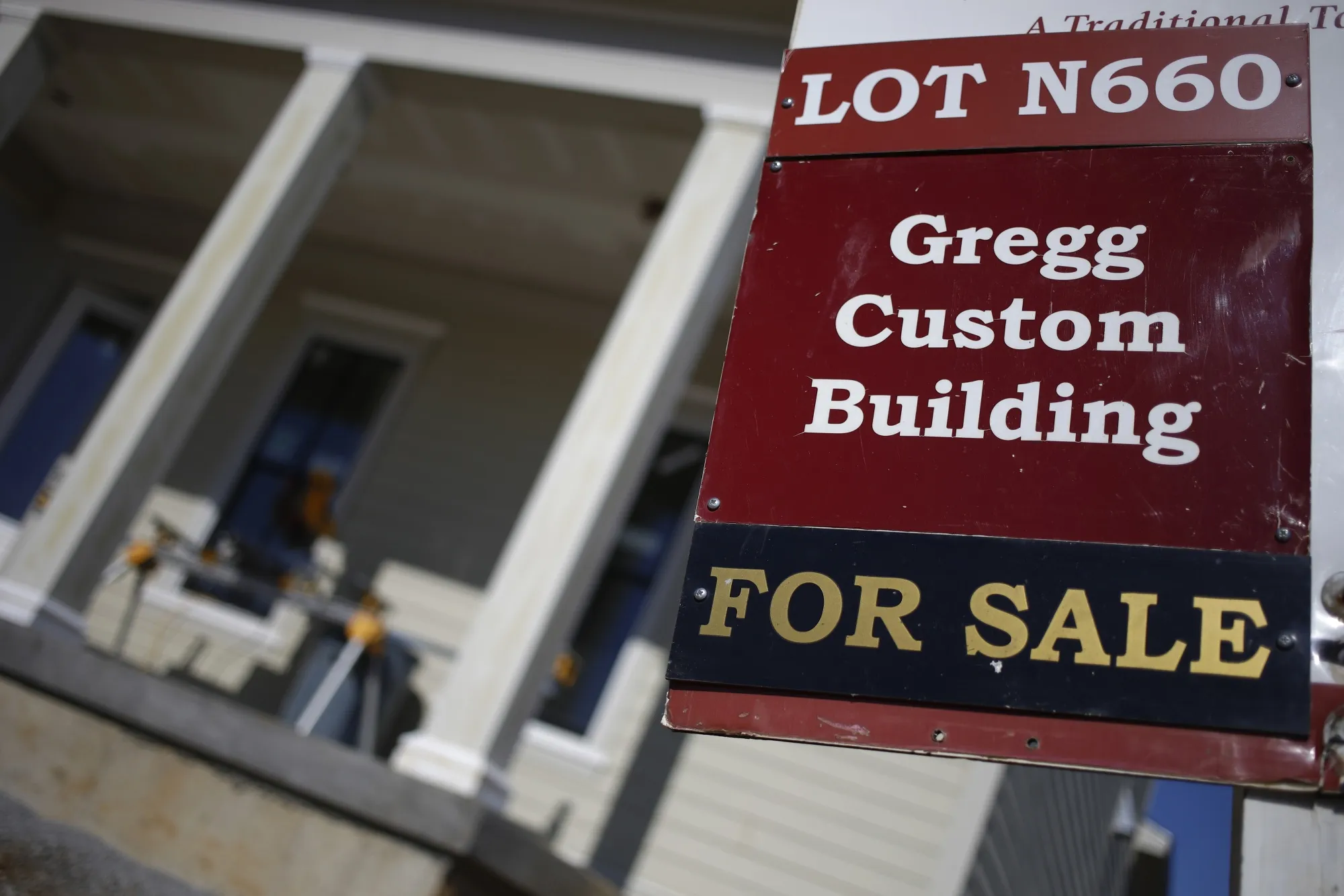 A "For Sale" sign outside a house under construction at the Norton Commons subdivision in Louisville, Kentucky, U.S., on Tuesday, Feb. 8, 2022.