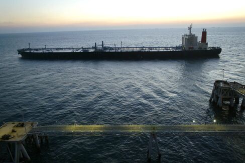 A tanker leaves the Basra Oil Terminal in the Gulf 50kms south of Iraq Sunday December 7, 2003.