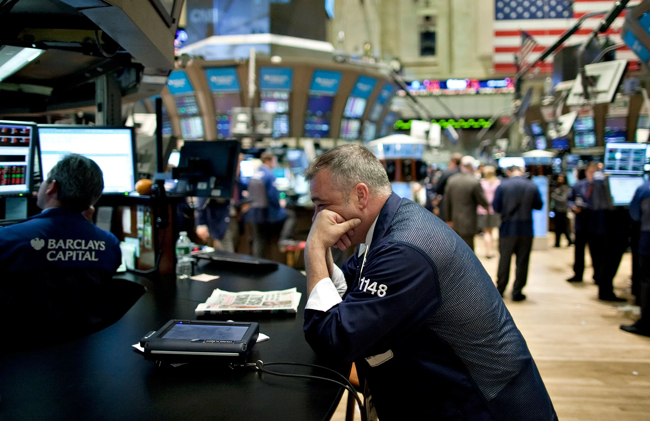 A trader on the floor of the New York Stock Exchange after the close on May 6, 2010. The Wall Street "flash crash" on May 6 that saw the Dow Jones index dive almost 1,000 points within minutes was sparked by a single 4.1-billion-dollar computer trade.
