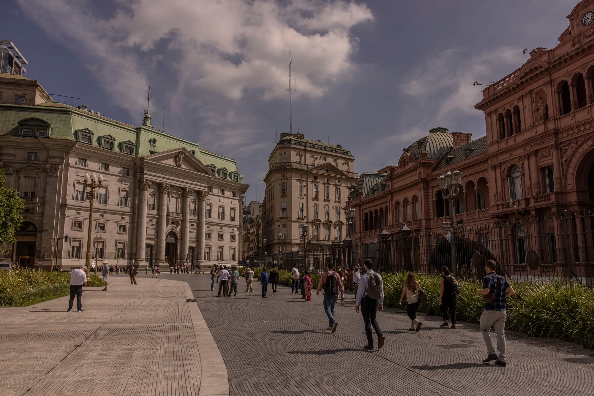 Pedestrians walk through Plaza de Mayo&nbsp;in Buenos Aires, Argentina.
