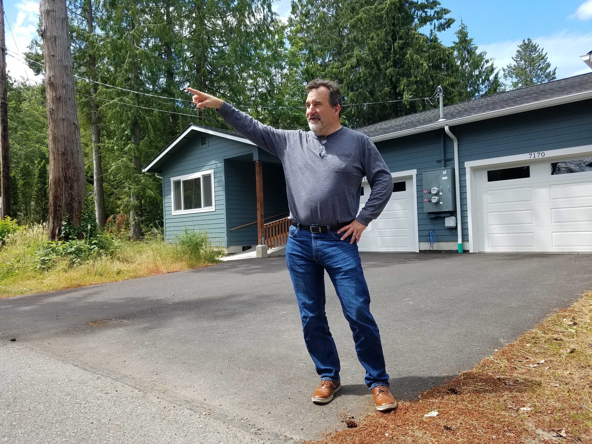 Leonard Forsman,&nbsp;chairperson&nbsp;of Suquamish tribal government, outside an affordable home on the&nbsp;tribe’s&nbsp;reservation near Seattle. Suquamish is using federal pandemic aid to create affordable housing.