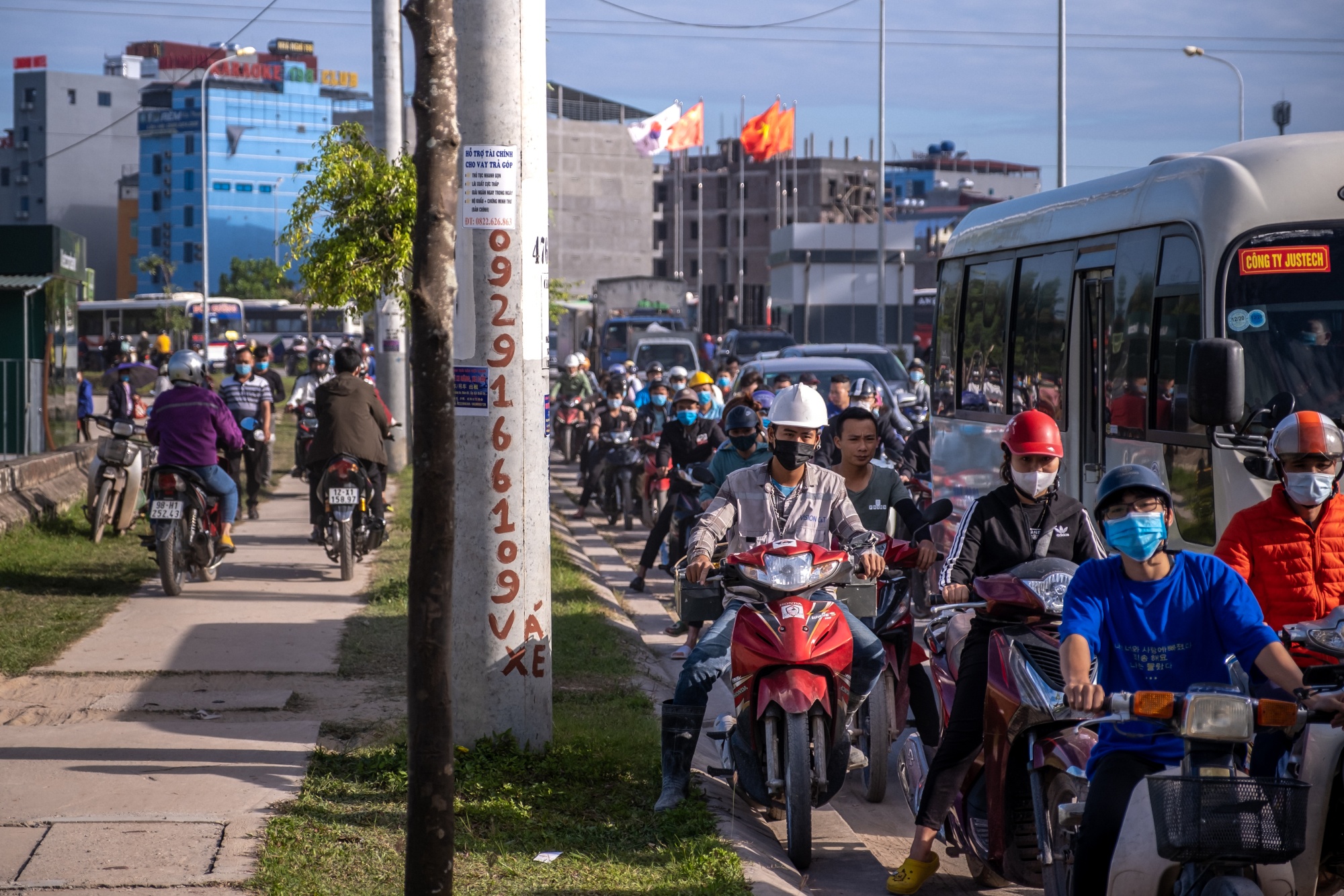 Commuters near the Van Trung Industrial Park in Bac Giang province, Vietnam.