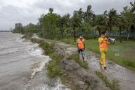 Volunteers of Cyclone Preparedness Programmer walk use a