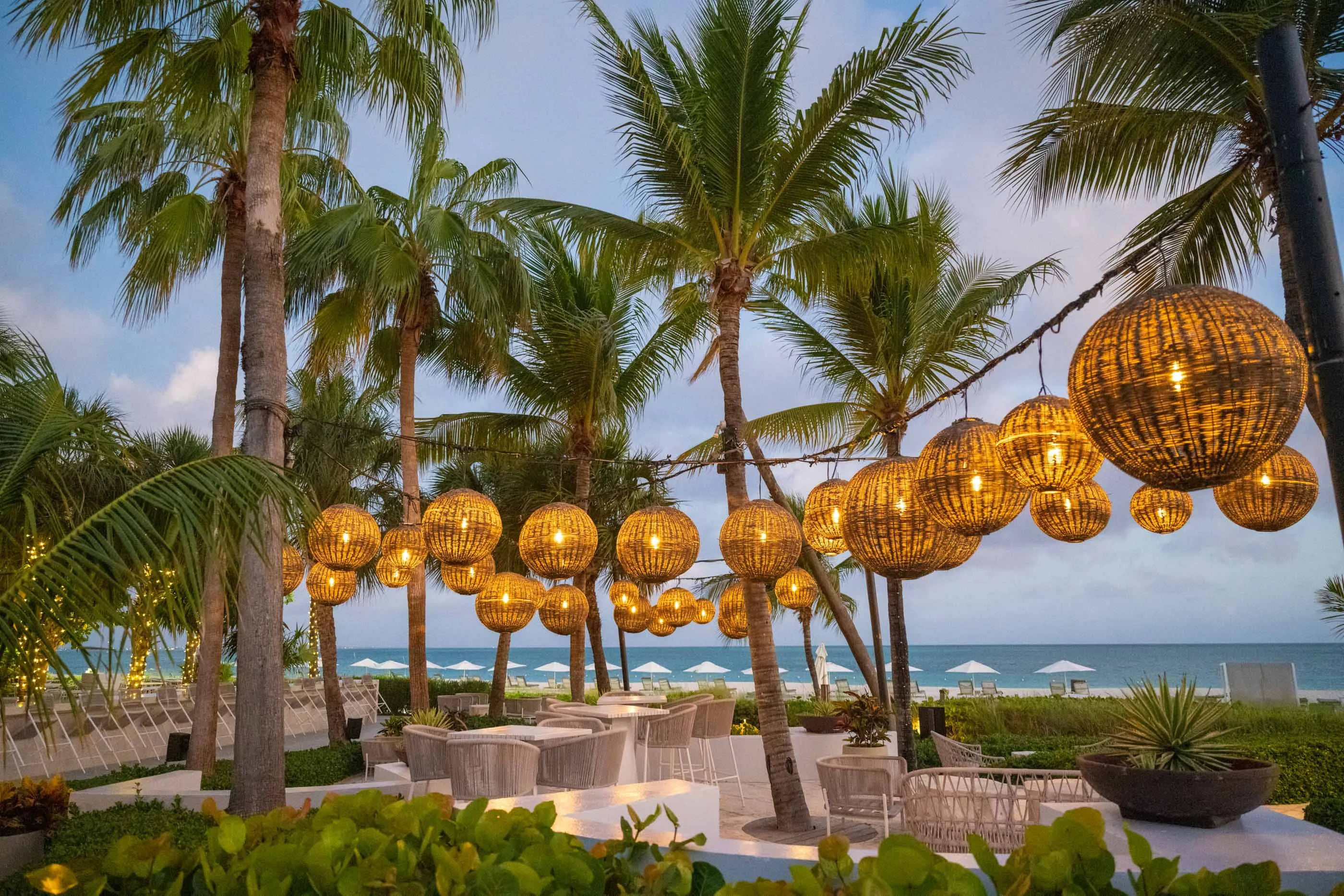 String lights adorn an outdoor dining space at Grace Bay Club in Turks and Caicos.