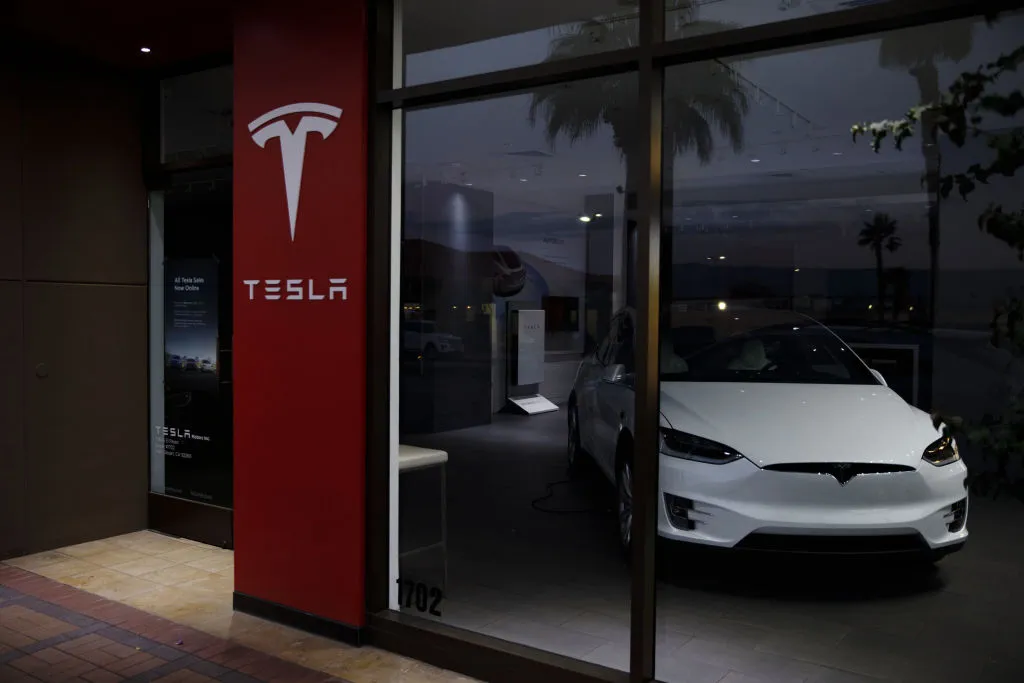 A Tesla store, which may or may not be an endangered species.
