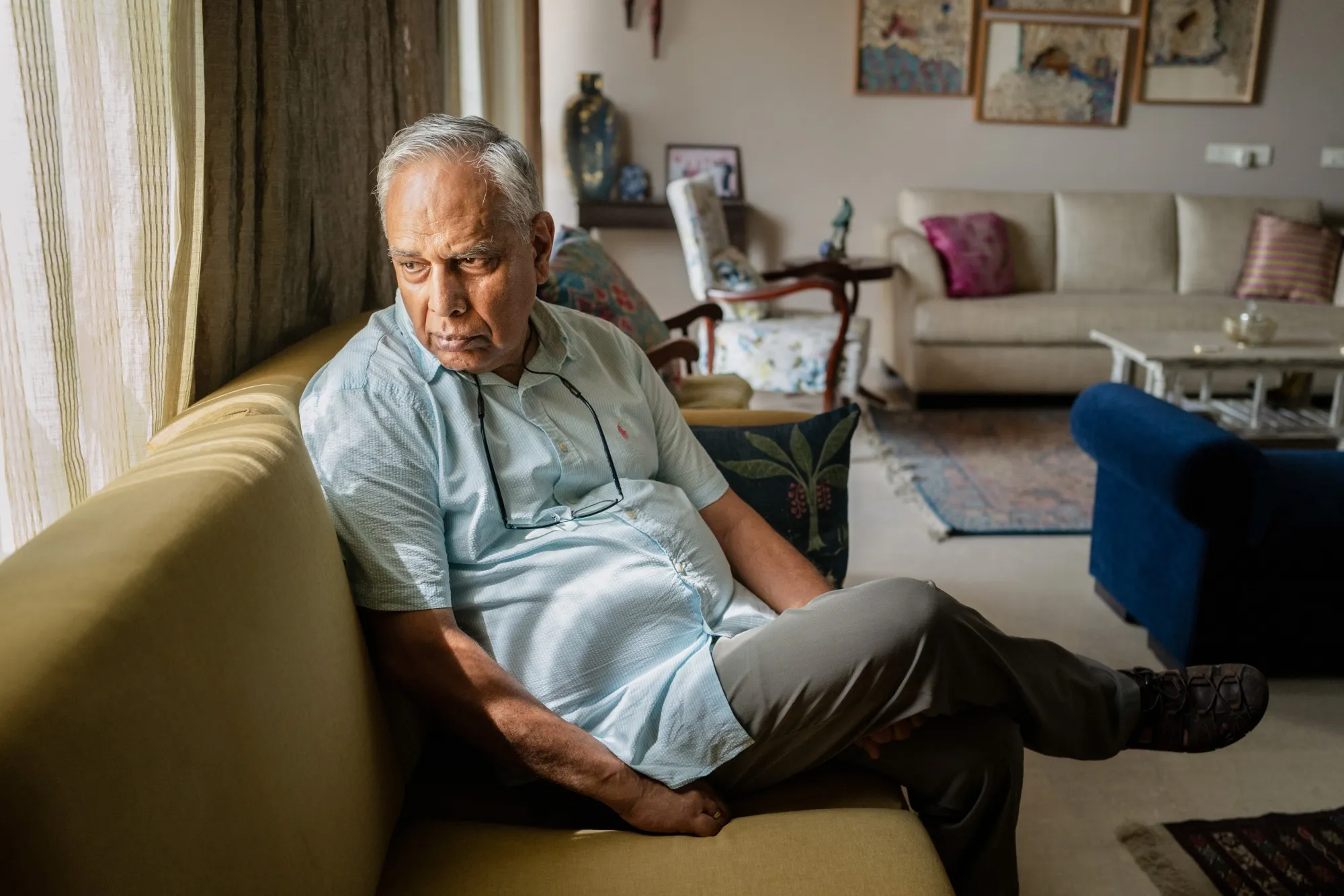 Biren Yadav, a digital arrest victim still fighting to recover his funds, at home in Gurugram, India, in September.