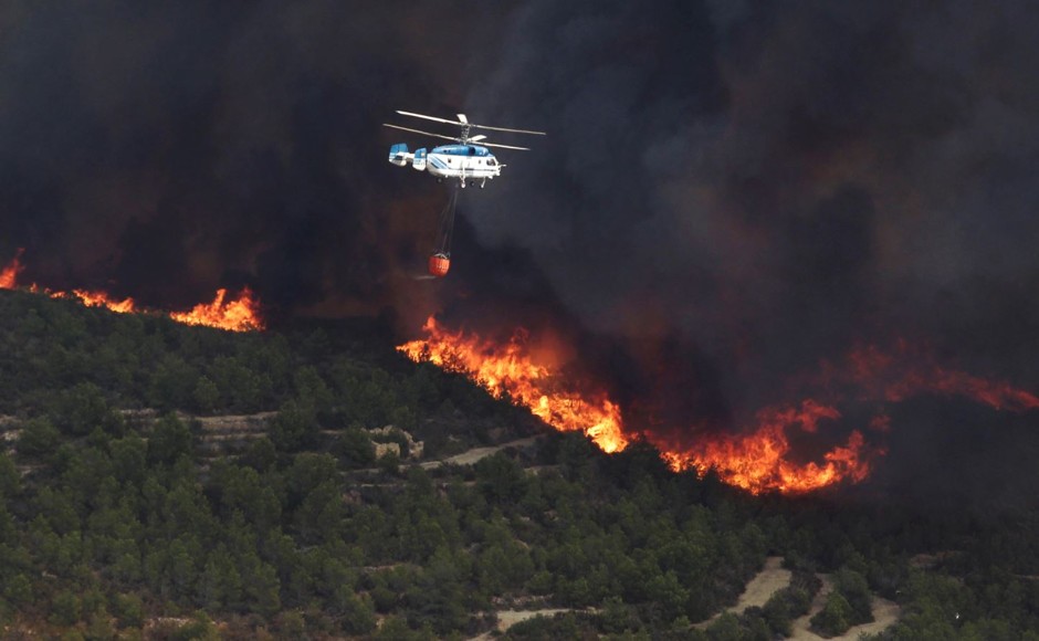 Wildfires like this September blaze in Spain are one kind of natural disaster expected to become worse in a warmer world.