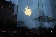 The Apple logo is seen reflected on the glass of its store on Fifth Avenue in New York on February 23, 2016.Apple is battling the US government over unlocking devices in at least 10 cases in addition to its high-profile dispute involving the iPhone of one of the San Bernardino attackers, court documents show. Apple has been locked in a legal and public relations battle with the US government in the California case, where the FBI is seeking technical assistance in hacking the iPhone of Syed Farook, a US citizen, who with his Pakistani wife Tashfeen Malik in December gunned down 14 people. / AFP / Jewel Samad (Photo credit should read JEWEL SAMAD/AFP/Getty Images)