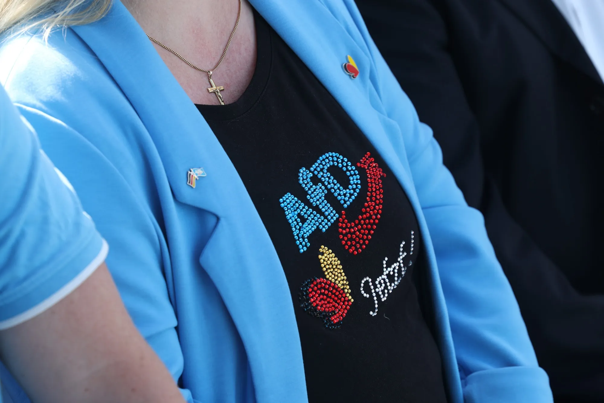 An Alternative for Germany supporter at an AfD event in Templin, on May 1.