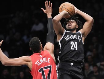 relates to Cam Thomas scores 23 points, Nets rally to beat Raptors 106-102 in home finale