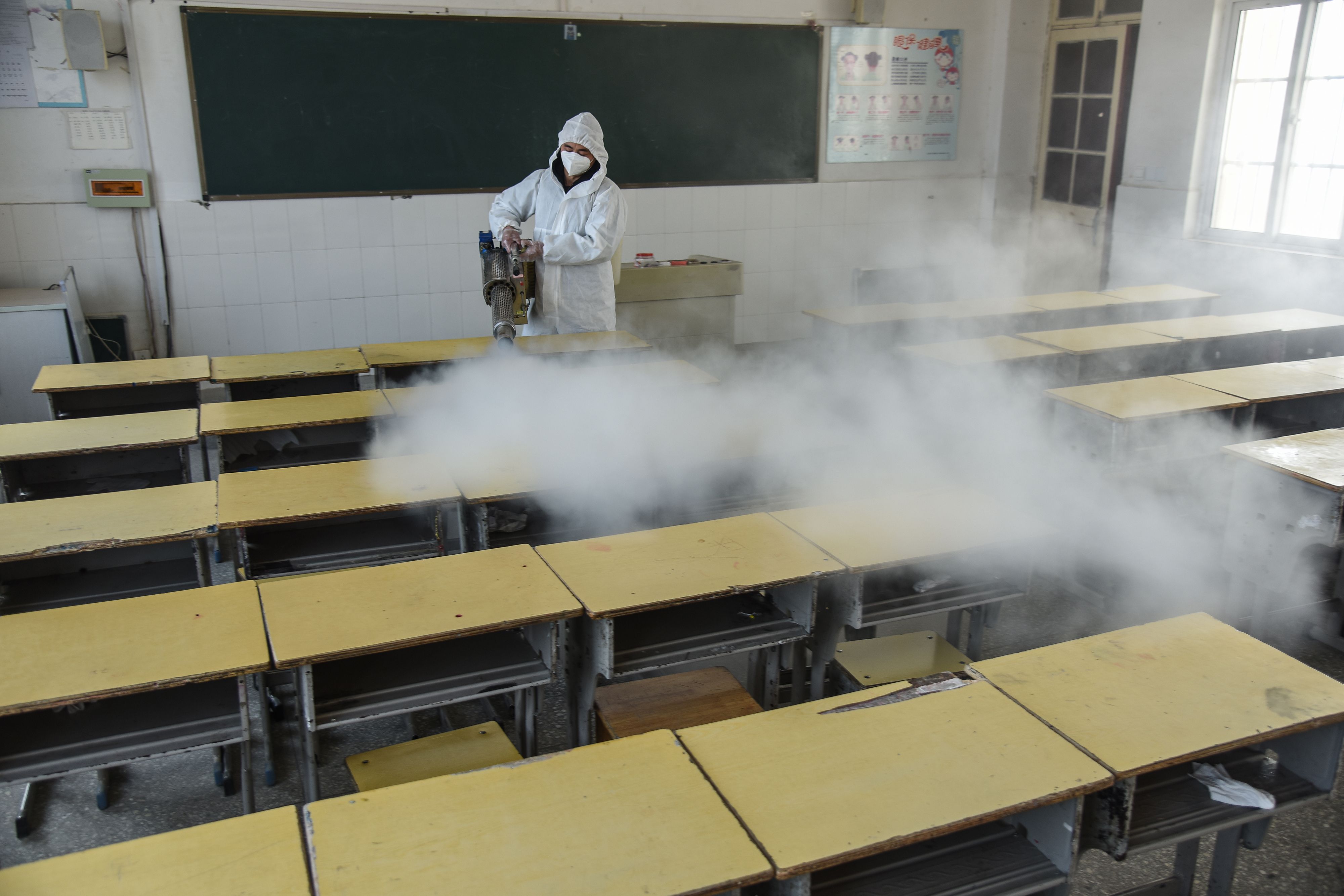 China Halts Some Classes Amid School Covid Cluster, Flu's Return - Bloomberg