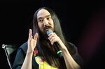 DJ Steve Aoki speaks during a panel at the NFT LA conference in Los Angeles, California, U.S., on Wednesday, March 30, 2022. NFT LA is an integrated conference experience fused with immersive Metaverse integrations.