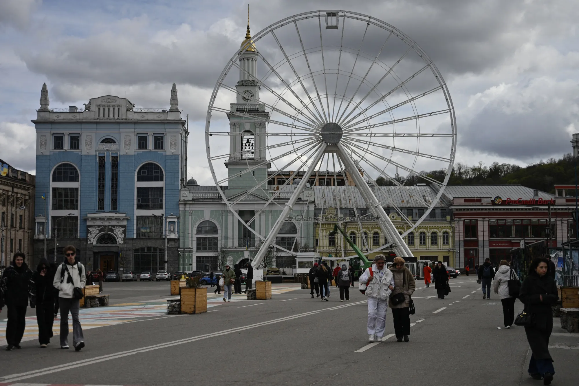 A partially disassembled ferris wheel on Kontraktova Square in Kyiv on April 7.