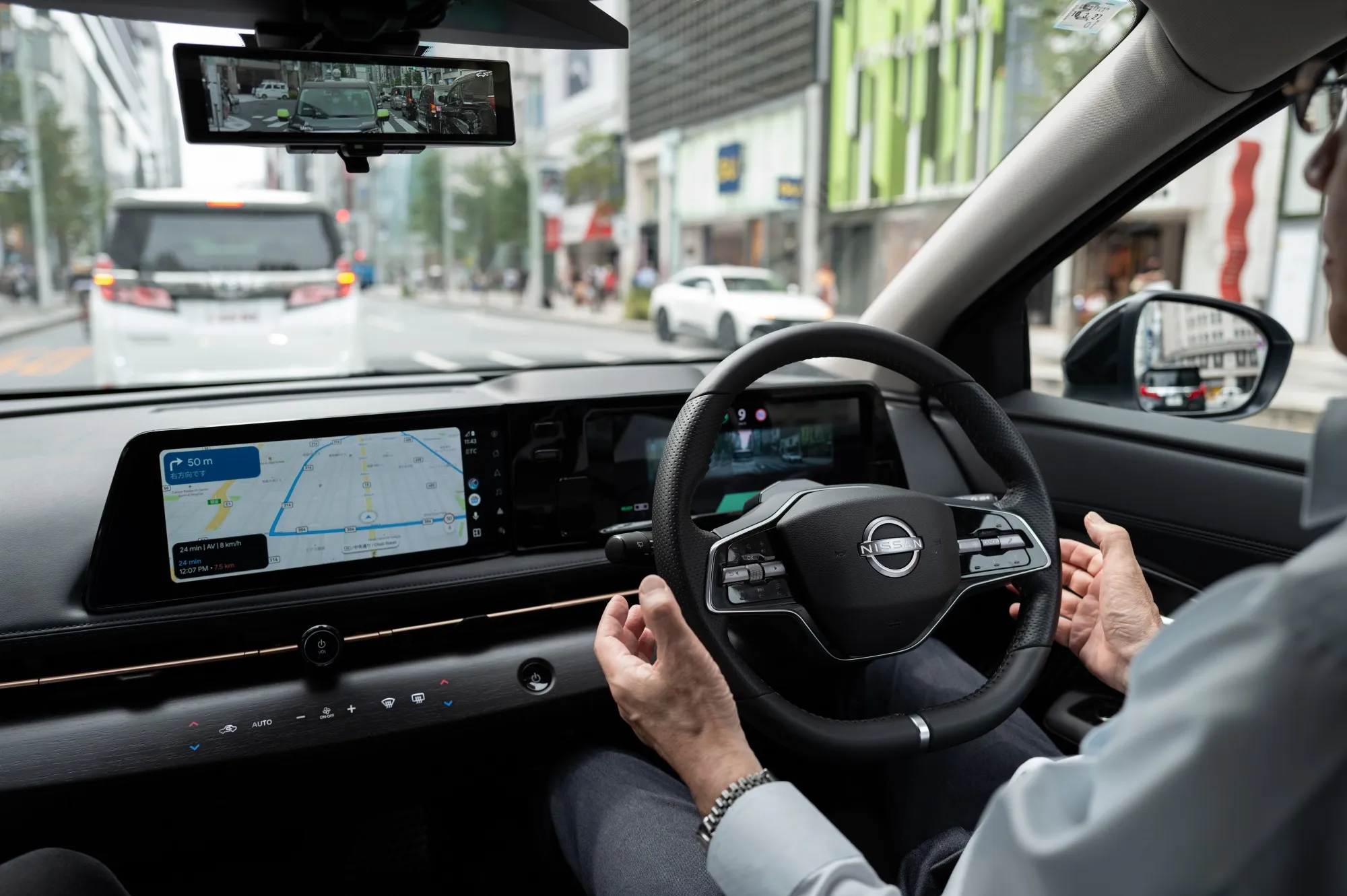 Nissan’s ProPilot navigates traffic while under human supervision during a test drive in Tokyo on Sept. 18.