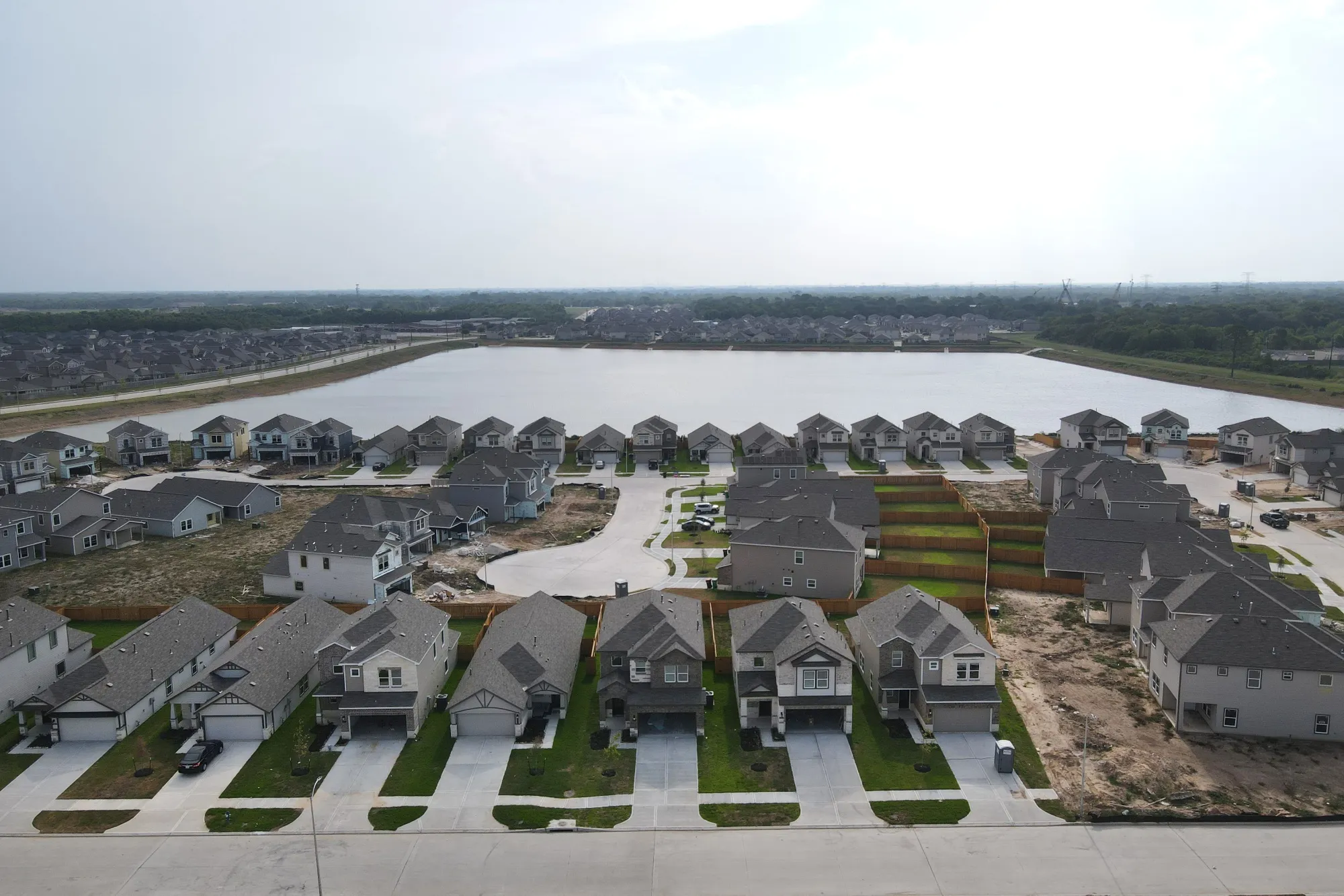 An overhead view of the Glendale Lakes community development in Arcola, Texas.