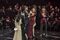 The Beckhams on stage during the countdown gala for Alibaba's annual Singles' Day online shopping event. Photographer: Qilai Shen/Bloomberg