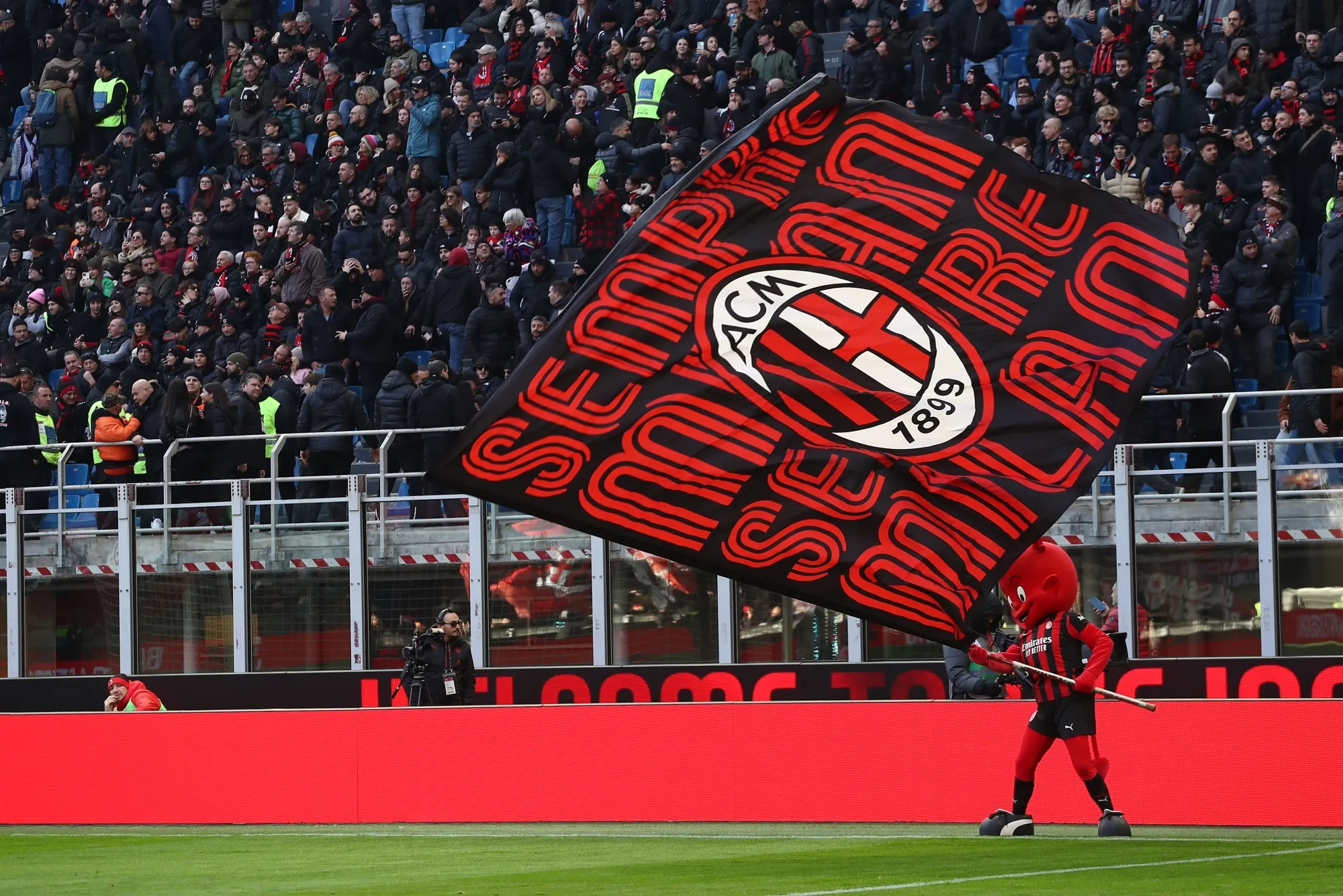 AC Milan mascot "Milanello" waves a AC Milan flag before a&nbsp;match&nbsp;in Milan.