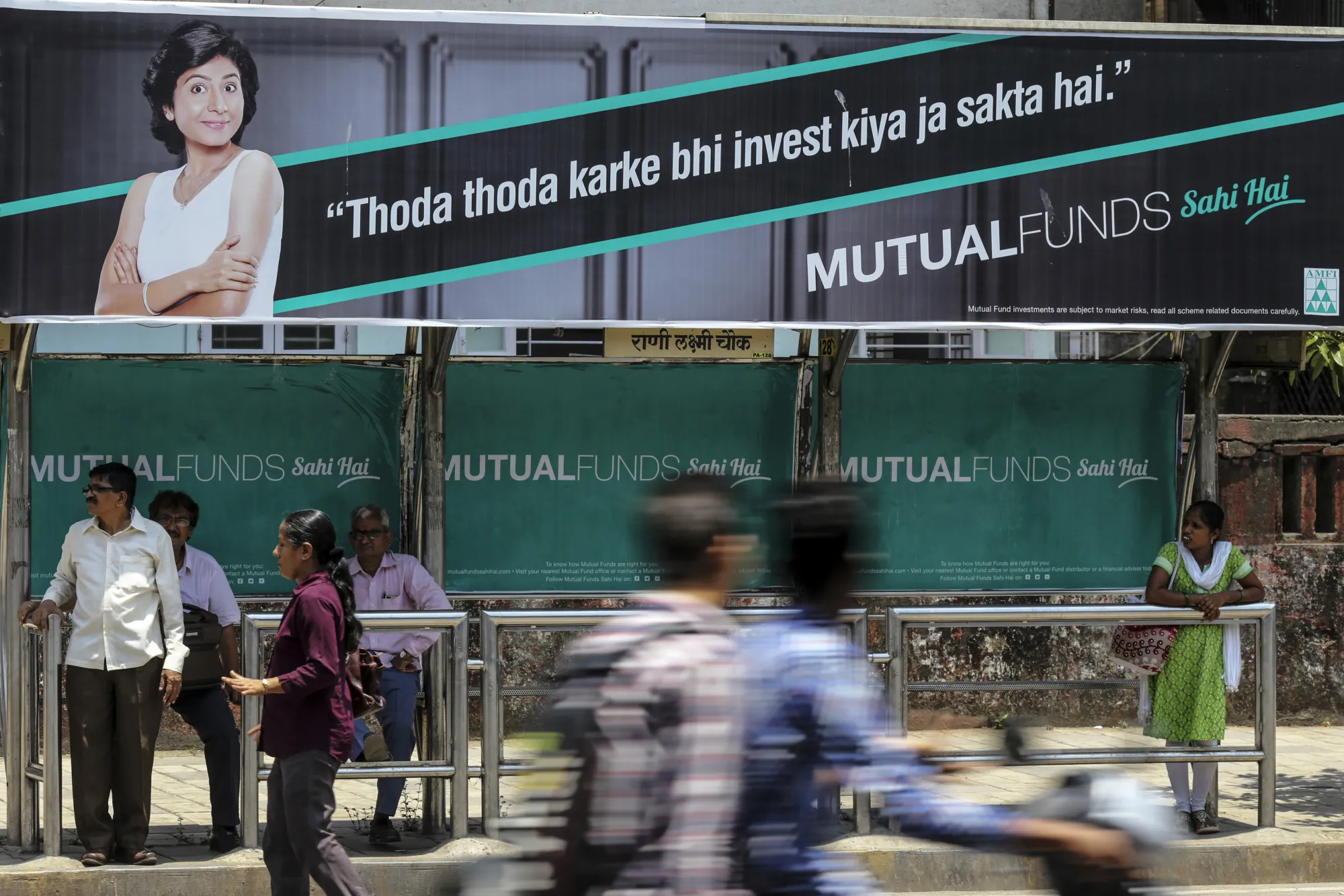 An advertisement for the Mutual Funds Sahi Hai campaign by the Association of Mutual Funds in India (AMFI) at a bus stop in Mumbai.
