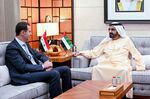 Syrian President Bashar al-Assad, left, meets with Sheikh Mohammed bin Rashid Al Maktoum in Abud Dhabi on March 18.