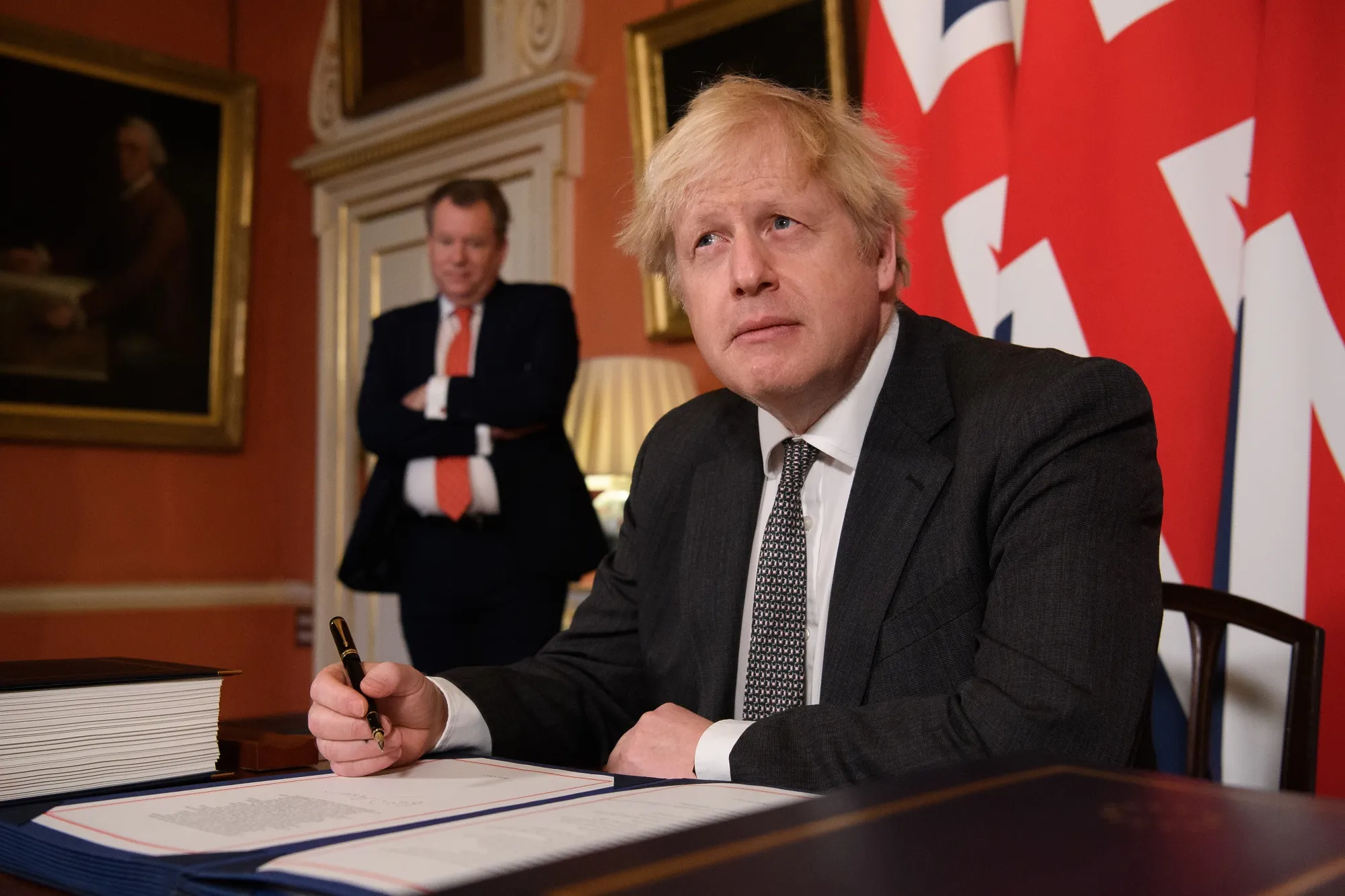 Boris Johnson poses for photographs after signing the Brexit trade deal with the EU.