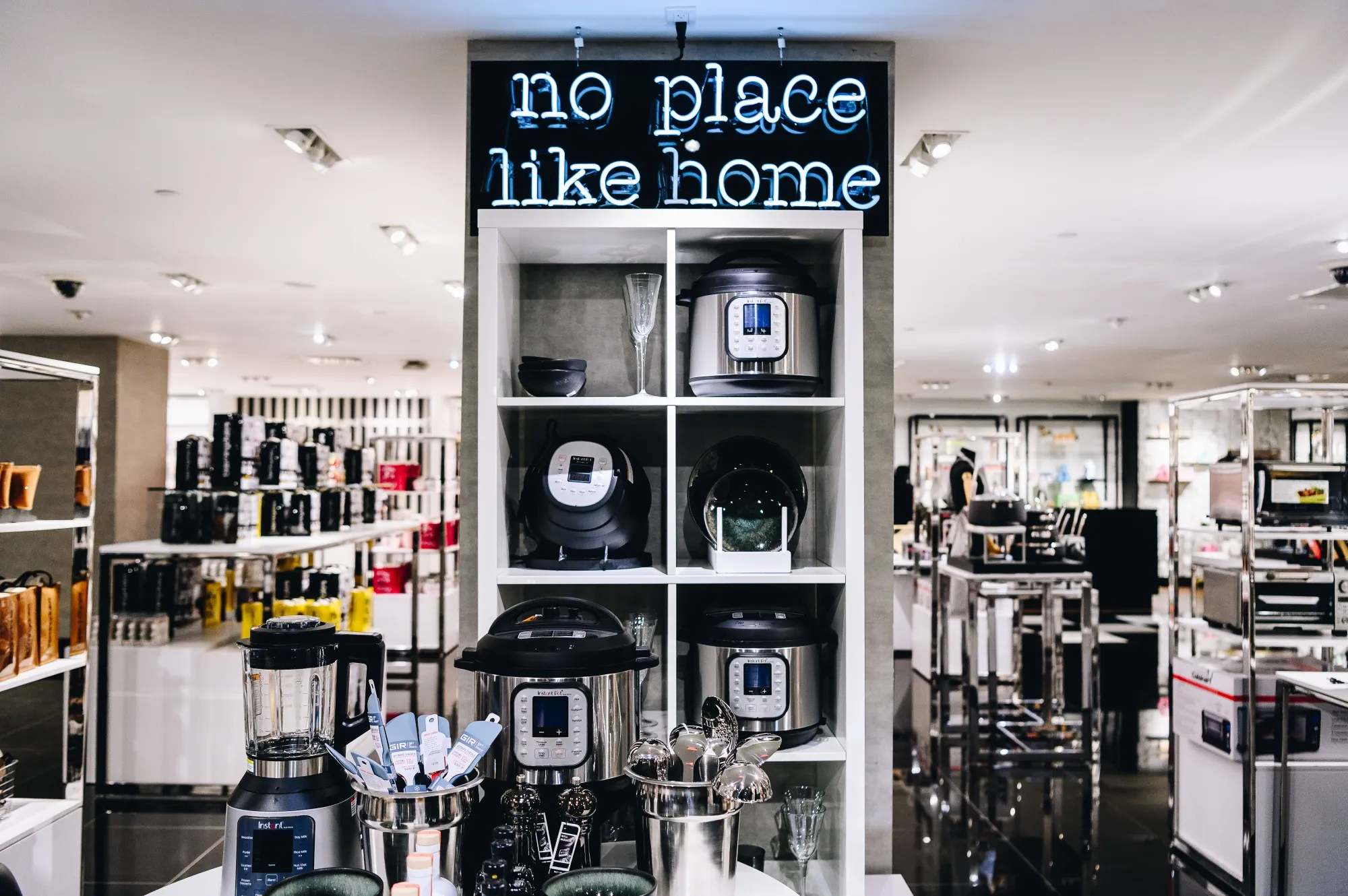 Instant Pot multicookers for sale at a department store.