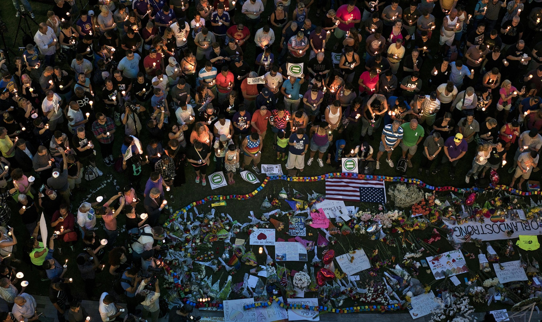 Mourners observe&nbsp;a moment of silence in Orlando, Florida&nbsp;for the mass shooting victims at the Pulse nightclub in&nbsp;2016.