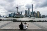 Buildings in Pudong's Lujiazui Financial District in Shanghai, China, on Wednesday, Sept. 10, 2025. China is in its third straight year of deflation for the first time since it started to transition away from central planning in the late 1970s. Photographer: Qilai Shen/Bloomberg