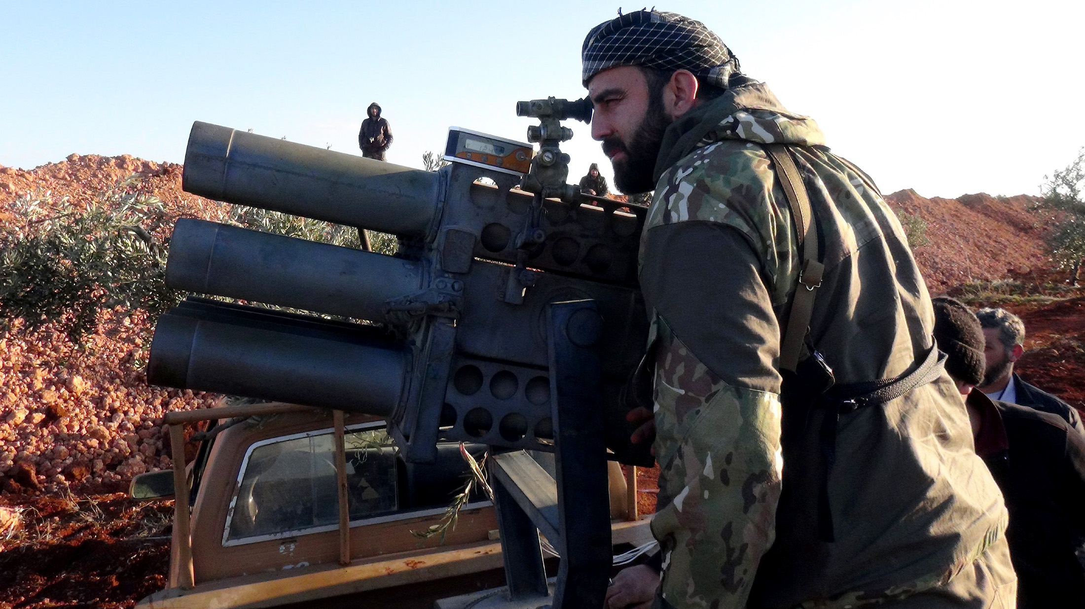 Syrian opposition forces prepare to attack regime controlled Tel Cibin village with heavy weapons, in Aleppo, on Feb. 2.
